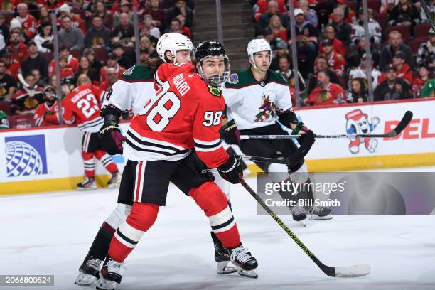 Connor Bedard of the Chicago Blackhawks watches for the puck in the third period against the Arizona Coyotes at the United Center on March 10, 2024...