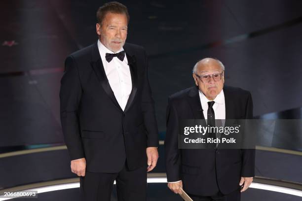 Arnold Schwarzenegger and Danny DeVito at the 96th Annual Oscars held at Dolby Theatre on March 10, 2024 in Los Angeles, California.
