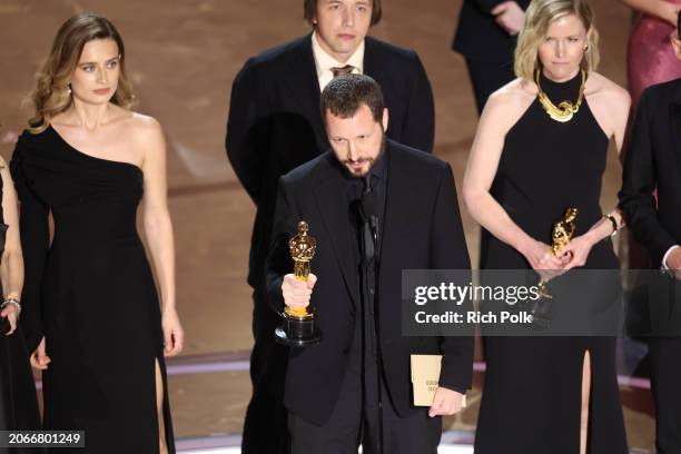 Evgeniy Maloletka, Mstyslav Chernov and Michelle Mizner win Best Documentary Feature for "20 Days in Mariupol" at the 96th Annual Oscars held at...