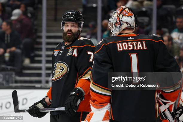 Radko Gudas of the Anaheim Ducks and Lukas Dostal meet on the ice during the second period against the New York Islanders at Honda Center on March...