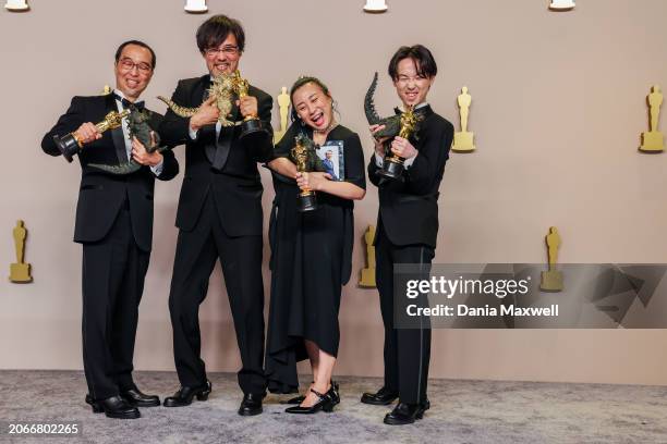 Hollywood, CA Masaki Takahashi, Takashi Yamazaki, Kiyoko Shibuya and Tatsuji Nojima, winners of the Best Visual Effects award for "Godzilla Minus...