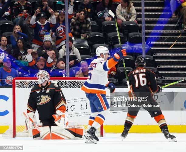 Cal Clutterbuck of the New York Islanders celebrates his goal with teammates during the third period against the Anaheim Ducks at Honda Center on...