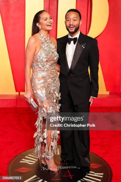 Chrissy Teigen and John Legend at the 2024 Vanity Fair Oscar Party held at the Wallis Annenberg Center for the Performing Arts on March 10, 2024 in...