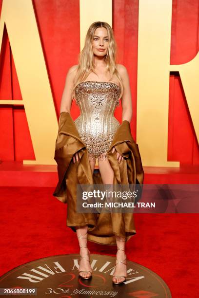 Australian actress Margot Robbie attends the Vanity Fair Oscars Party at the Wallis Annenberg Center for the Performing Arts in Beverly Hills,...