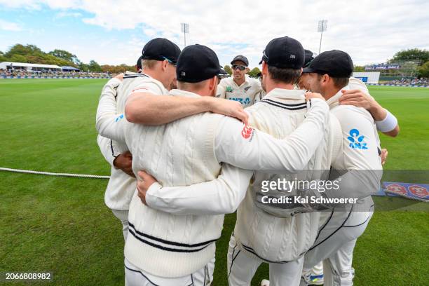 Captain Tim Southee of New Zealand and his team mates huddle during day four of the Second Test in the series between New Zealand and Australia at...