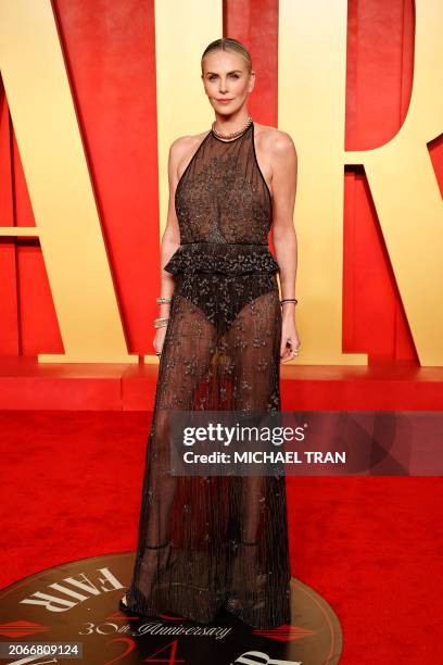 South African actress Charlize Theron attends the Vanity Fair Oscars Party at the Wallis Annenberg Center for the Performing Arts in Beverly Hills,...