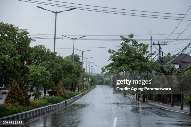 An empty street is seen during the day of silence of Nyepi Day on March 11, 2024 in Jimbaran, Bali, Indonesia. Nyepi is a holy day that marks the...