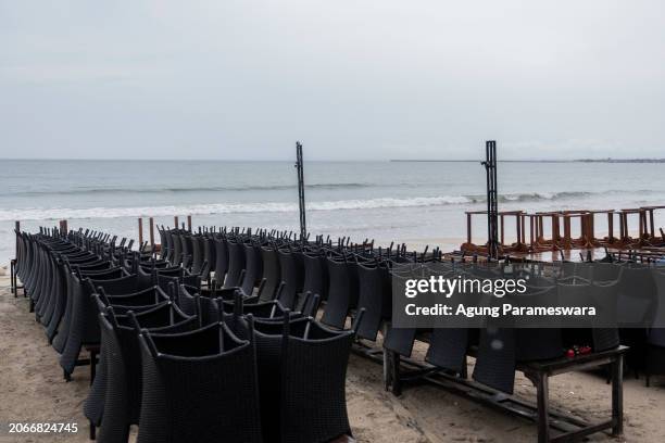 An empty seafood restaurant is seen during the day of silence of Nyepi Day on March 11, 2024 in Jimbaran beach, Bali, Indonesia. Nyepi is a holy day...