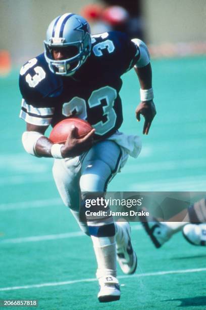 Dallas Cowboys running back Tony Dorsett carries the ball during a regular season game against the St. Louis Cardinals on October 4, 1981 at Civic...