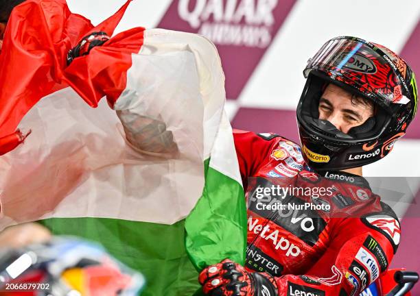 Italian MotoGP rider Francesco Bagnaia of the Ducati Lenovo Team is celebrating after winning the MotoGP race of the Motorcycling Grand Prix of Qatar...