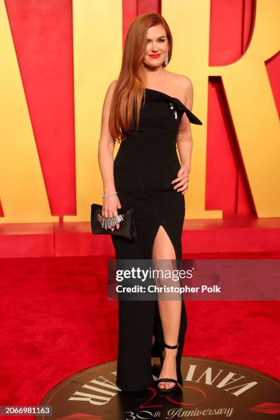 Isla Fisher at the 2024 Vanity Fair Oscar Party held at the Wallis Annenberg Center for the Performing Arts on March 10, 2024 in Beverly Hills,...