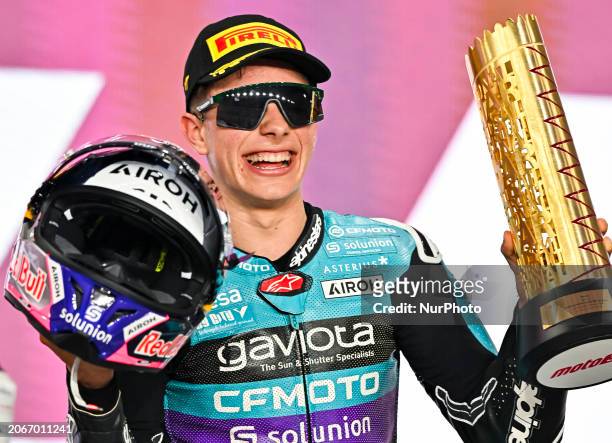 Colombian Moto3 rider David Alonso from the CFMOTO Aspar Team is celebrating on the podium after winning the Moto3 race of the Motorcycling Grand...