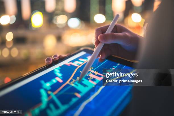 financial consultant / advisor analysis investment landscape asset allocation in many assets - investmentfonds stock-fotos und bilder