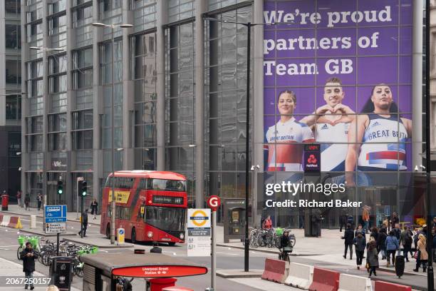 With months before the 2024 Paris Olympics, a huge image of Team GB athletes, BMX rider Beth Shriever, gymnast Max Whitlock and weightlifter Emily...