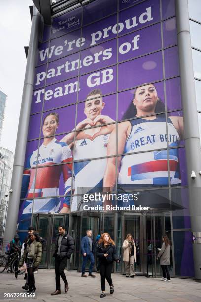 With months before the 2024 Paris Olympics, a huge image of Team GB athletes, BMX rider Beth Shriever, gymnast Max Whitlock and weightlifter Emily...