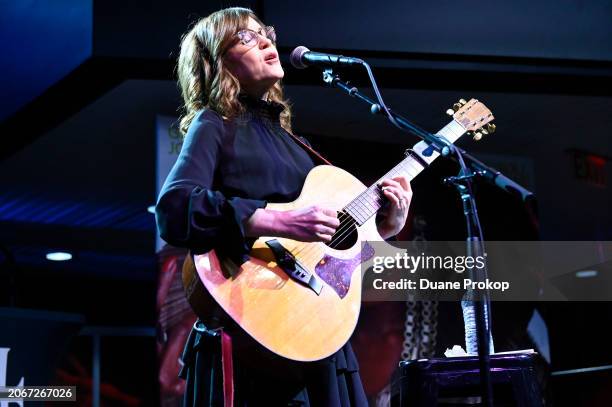 Lisa Loeb performs during the "Revolutionary Women in Music: Left of Center" exhibit dedication at the Rock & Roll Hall of Fame and Museum on March...