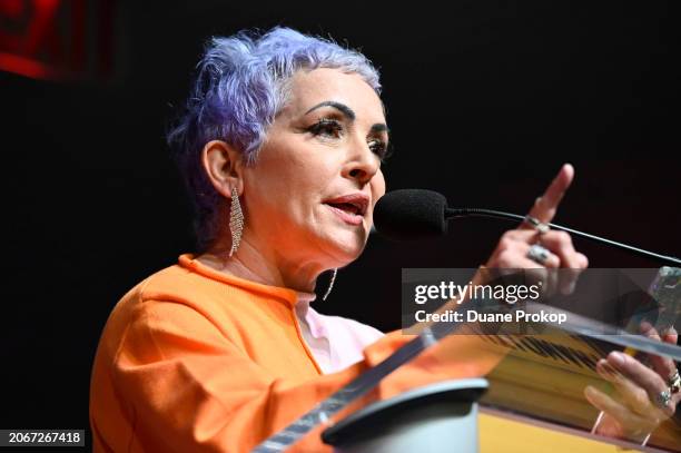 Rock & Roll Hall of Fame Inductee Jane Wiedlin of the Go-Go’s speaks during the "Revolutionary Women in Music: Left of Center" exhibit dedication at...