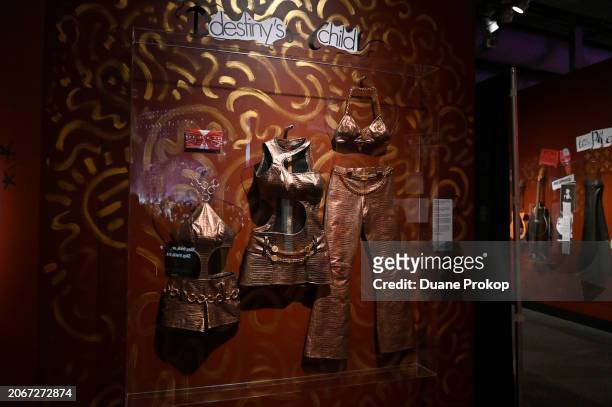 Kelly Rowland, Beyonce and Michelle Williams of Destiny's Child outfits from the music video for "Independent Women Part I" are on display during the...
