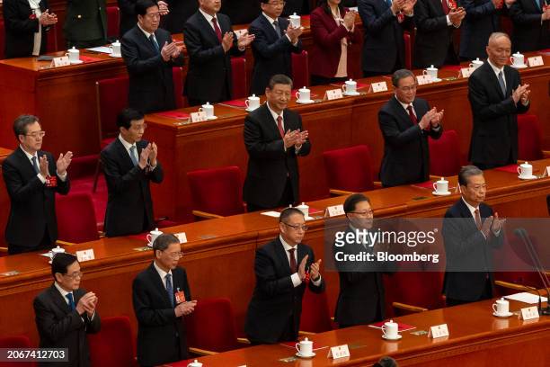 Xi Jinping, China's president, center, during the closing of the Second Session of the 14th National People's Congress at the Great Hall of the...