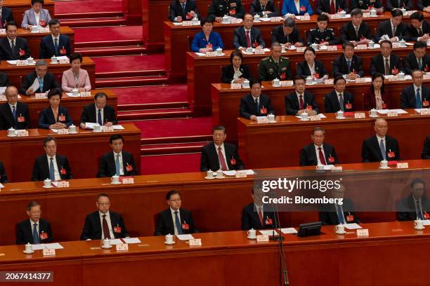 Xi Jinping, China's president, center, during the closing of the Second Session of the 14th National People's Congress at the Great Hall of the...