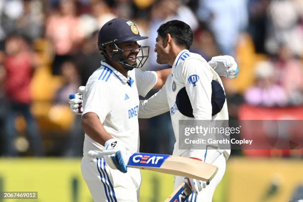 Shubman Gill of India celebrates reaching his century with captain Rohit Sharma during day two of the 5th Test Match between India and England at...
