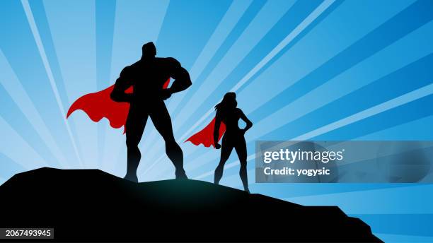 stockillustraties, clipart, cartoons en iconen met vector superhero duo silhouette on a rock stock illustration - superheld