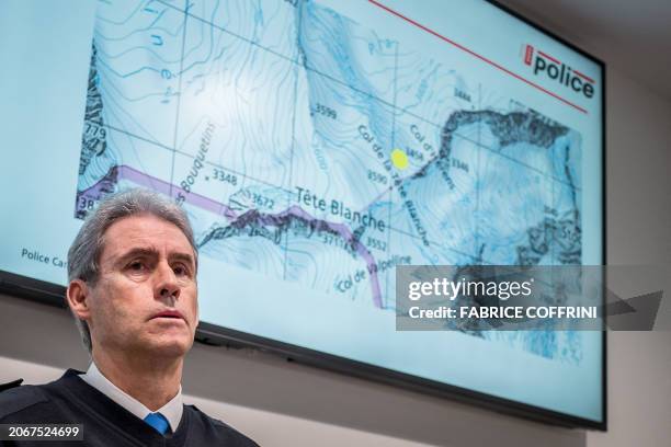 Head of the Police of the Swiss Canton of Valais, Christian Varone addresses a press conference, after five of six cross-country skiers who went...