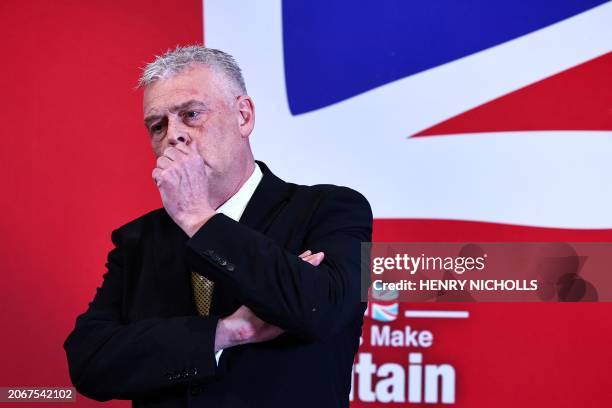 Former Conservative deputy chairman Lee Anderson reacts during a press conference to announce his defection from the Conservative party to Reform UK,...