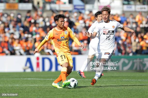 Yosuke Kawai of Shimizu S-Pulse controls the ball against Gakuto Notsuda of Vegalta Sendai during the J.League J1 match between Shimizu S-Pulse and...