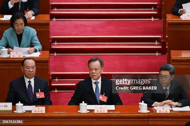 Guangdong province Communist Party Secretary Huang Kunming, Tianjin Communist Party Secretary Chen Min'er, and Chen Wenqing, a member of the...