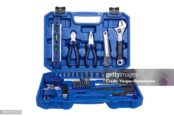 tools in a blue plastic tool box isolated on white background - boîte à outils photos et images de collection