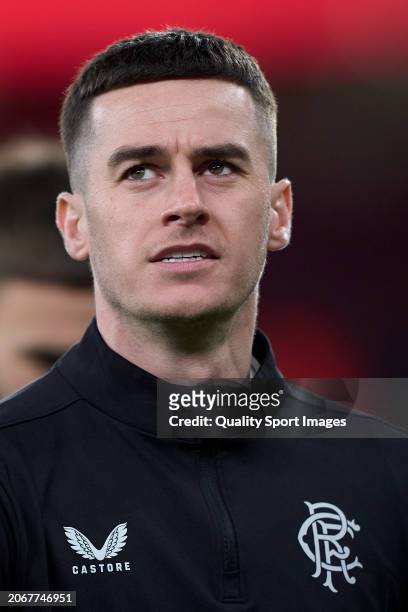 Tom Lawrence of Rangers FC looks on during the warm up prior to the UEFA Europa League 2023/24 round of 16 first leg match between SL Benfica and...