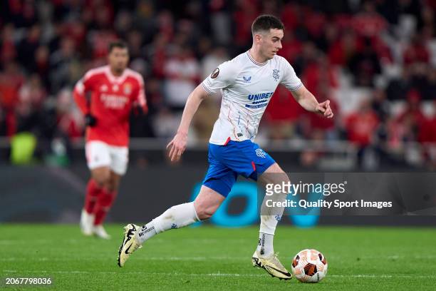 Tom Lawrence of Rangers FC in action during the UEFA Europa League 2023/24 round of 16 first leg match between SL Benfica and Rangers FC at Estadio...