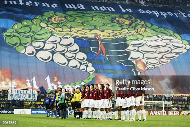 Milan and Inter Milan line up prior to kick off during the UEFA Champions League semi final second leg match between Inter Milan and AC Milan on May...