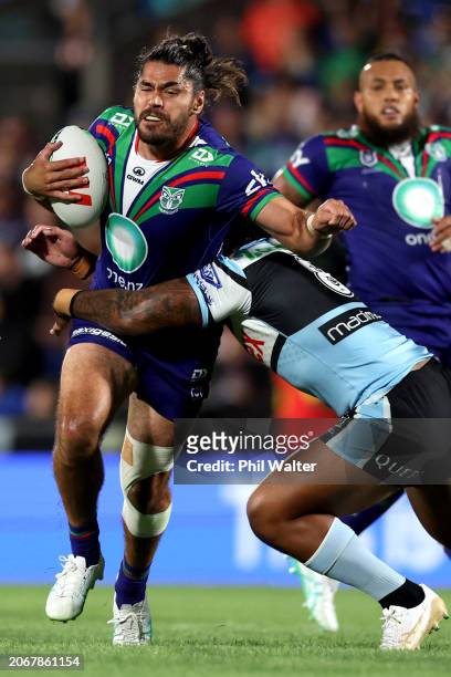 Tohu Harris of the Warriors is tackled during the round one NRL match between New Zealand Warriors and Cronulla Sharks at Go Media Stadium Mt Smart,...
