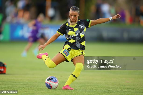 Macey Fraser of the Phoenix crosses the ball as she warm's up during the A-League Women round 19 match between Perth Glory and Wellington Phoenix at...