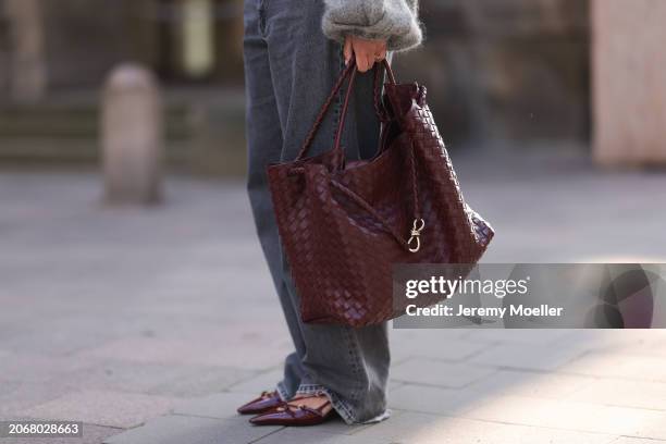 Aylin Koenig seen wearing Loewe grey logo knit oversized sweater, Massimo Dutti grey wide leg baggy denim / jeans pants, Bottega Veneta burgundy...