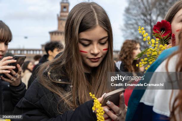 Student and feminist activist takes part in a rally, demonstrating against Patriarchy and violence, on March 08, 2024 in Milan, Italy. Festa della...