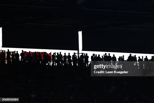 Fans are seen in the stands during the Bundesliga match between 1. FC Köln and Bayer 04 Leverkusen at RheinEnergieStadion on March 03, 2024 in...