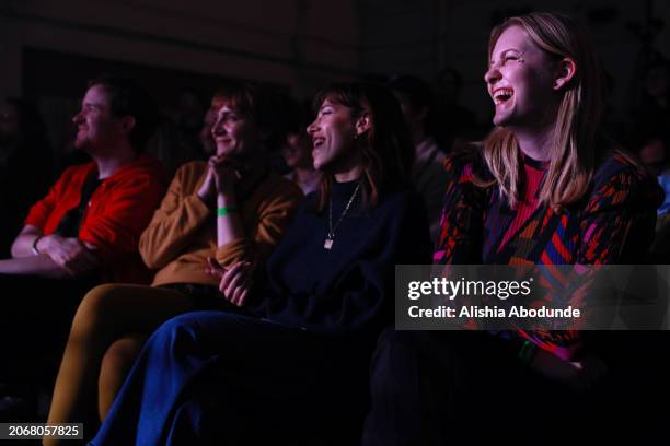 Members of the audience react during the all female wrestling event on March 8, 2024 in London, England. Eve was founded in 2006 by married couple...