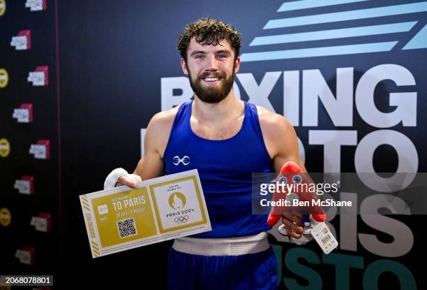 Lombardy , Italy - 11 March 2024; Patrick Brown of Great Britain celebrates after qualifying for the Olympics after winning their Men's 92kg...