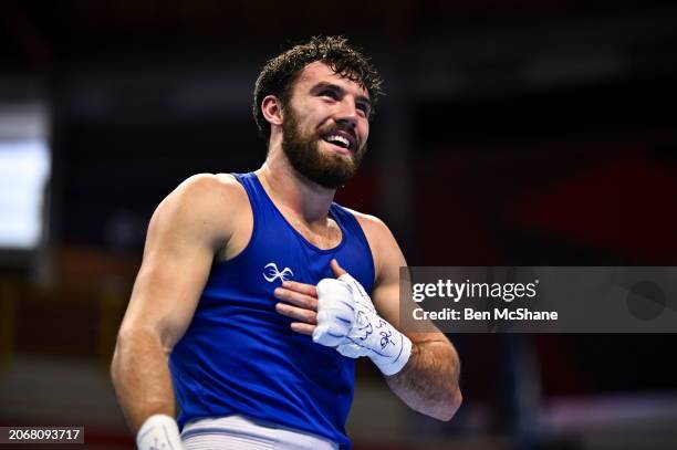 Lombardy , Italy - 11 March 2024; Patrick Brown of Great Britain celebrates after qualifying for the Olympics after winning their Men's 92kg...