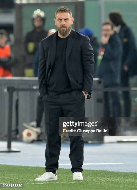 Daniele De Rossi head coach of AS Roma looks on during the UEFA Europa League 2023/24 round of 16 first leg match between AS Roma and Brighton & Hove...