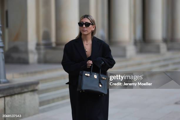 Aylin Koenig seen wearing Saint Laurent black sunglasses, Cartier Love gold yellow necklace, Ole Lynggaard elephant yellow gold necklace, By Aylin...