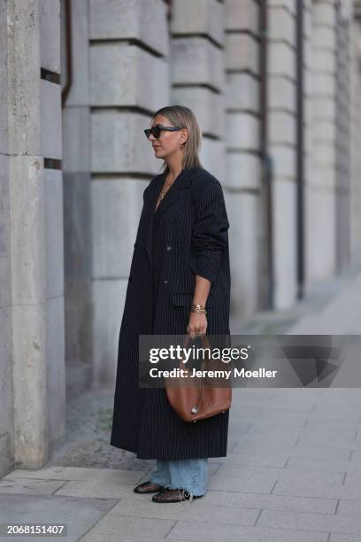 Aylin Koenig seen wearing Celine black sunglasses, gold earrings, Cartier Love gold yellow necklace, Ole Lynggaard elephant yellow gold necklace, By...