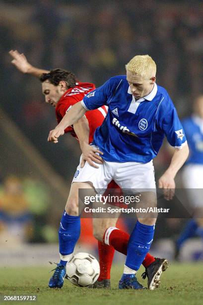 March 3: Jonathan Greening of Middlesbrough and Mikael Forssell of Birmingham City challenge during the Premier League match between Birmingham City...