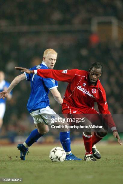 March 3: Ugo Ehiogu of Middlesbrough and Mikael Forssell of Birmingham City challenge during the Premier League match between Birmingham City and...