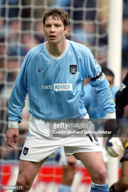 March 14: Michael Tarnat of Manchester City in action during the Premier League match between Manchester City and Manchester United at Sports City on...