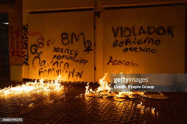 March 8 Playa del Carmen, Mexico: Women set fire to the entrance of the Mayor's Office during a march to commemorate International Women's Day.