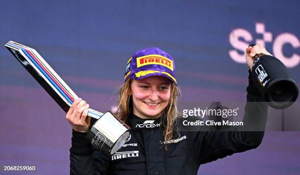Race winner Doriane Pin of France and PREMA Racing celebrates on the podium during Round 1 Jeddah race 1 of the F1 Academy at Jeddah Corniche Circuit...